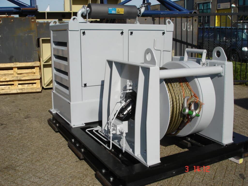 Integrated hydraulic winch and PowerPack system for mobile or temporary marine installations